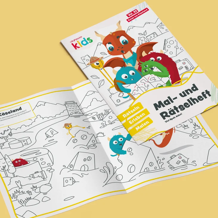 Das VAPIANO Mal- und Rätselheft "Reise ins Käseland" auf gelben Untergrund.